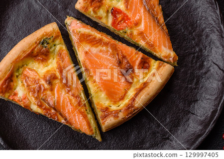 Quiche, salmon pie, broccoli, cheese. Quiche tart with fish and vegetables, cheese Quiche, salmon pie, broccoli, cheese. Quiche tart with fish and vegetables, cheese 129997405