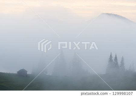 Autumn Morning Fog In Mountain Village With Barn 129998107