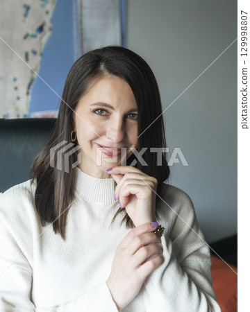 elegant woman over 40, business lady, works in the office 129998807