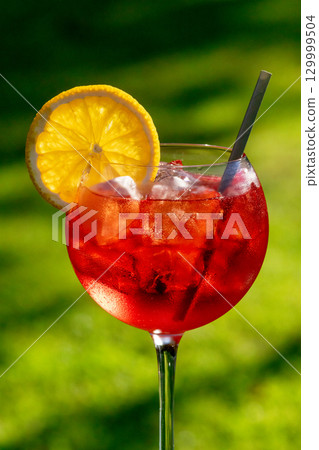 glass of classic red spritz cocktail glass of classic red spritz cocktail 129999504