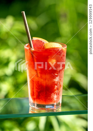 glass of classic red spritz cocktail 129999543