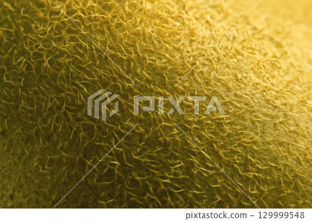Macro close-up of kiwi fruit peel background material Macro close-up of kiwi fruit peel background material 129999548