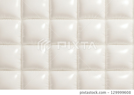 Ivory glossy quilted texture soft background material 129999608