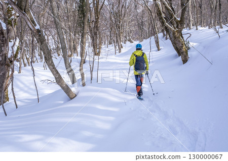 Image of enjoying fresh snow in the forest on snowshoes Oyamakiyazawa mountain stream 130000067