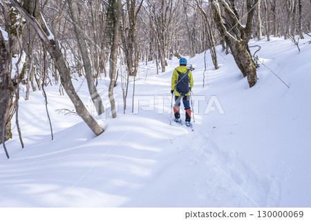 Image of enjoying fresh snow in the forest on snowshoes Oyamakiyazawa mountain stream 130000069