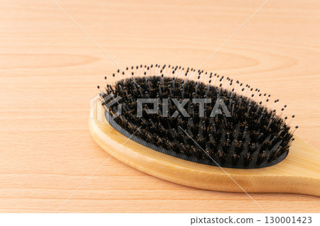 Close-up of a boar bristle hairbrush 130001423