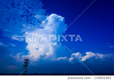 The white of the large cumulonimbus clouds against the blue sky is beautiful. The white of the large cumulonimbus clouds against the blue sky is beautiful. 130002805