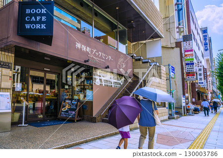 Tokyo cityscape in Japan: Kanda Jinbocho, a used bookstore district with shops lined up facing north. In the back is Jimbocho Station Exit A1... (August 21st) 130003786
