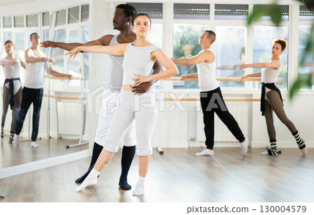 Man and woman dancing couples ballet dance together 130004579