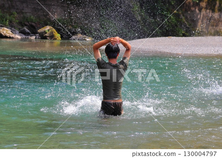 Playing in the river, boys, high school students 130004797