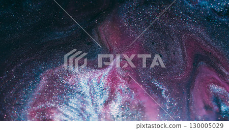Flowing wave. Glitter fluid. Defocused pink purple silver color paint sparkling droplets spreading on abstract marble art background. 130005029