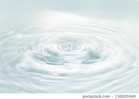 Drops of water falling on the surface of the water. 130005040