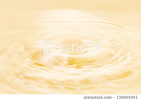 Drops of water falling on the surface of the water. Drops of water falling on the surface of the water. 130005041