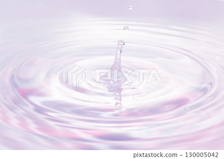 Drops of water falling on the surface of the water. Drops of water falling on the surface of the water. 130005042