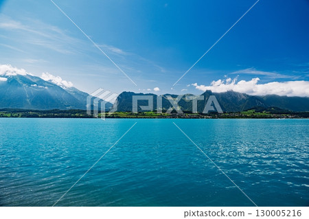 Serene Lake Thun, Switzerland Landscape Turquoise Waters and Majestic Mountain Views 130005216
