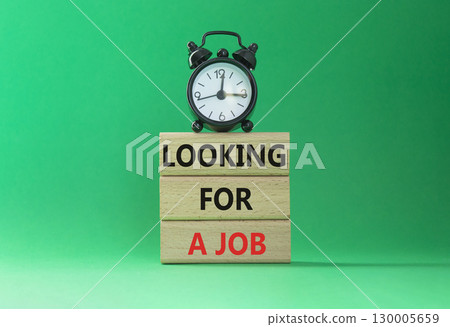 Looking for a job symbol. Concept words Looking for a job on wooden blocks. Beautiful green background with alarm clock. Business and Looking for a job concept. Copy space. Looking for a job symbol. Concept words Looking for a job on wooden blocks. Beautiful green background with alarm clock. Business and Looking for a job concept. Copy space. 130005659