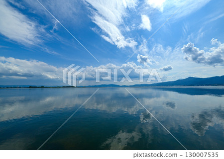 Calm Lake Biwa and clouds reflected on the lake surface Calm Lake Biwa and clouds reflected on the lake surface 130007535