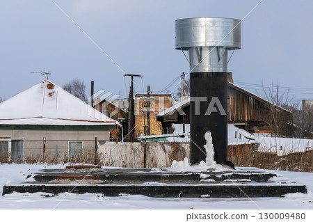 Ventilation pipe on the roof of the building. 130009480