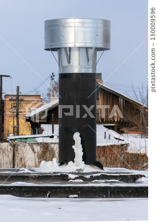 Ventilation pipe on the roof of the building. 130009596