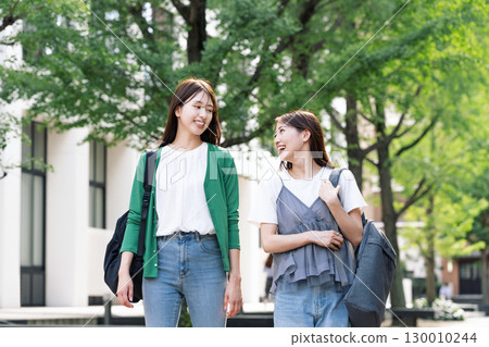 Young woman going out with friends Young woman going out with friends 130010244