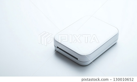 A white device with a square shape A white device with a square shape 130010652