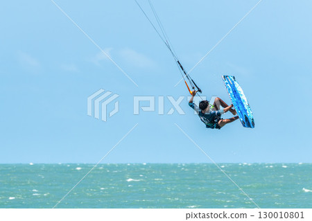 Kite surfing at Barra Grande beach on the coast of Piaui, northe Kite surfing at Barra Grande beach on the coast of Piaui, northe 130010801