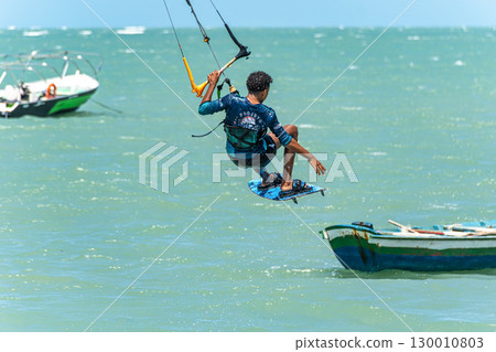 Kite surfing at Barra Grande beach on the coast of Piaui, northe 130010803