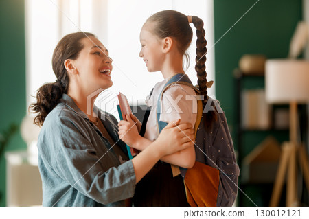 Happy family preparing for school Happy family preparing for school 130012121