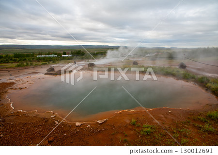 A pond near the Strokkur geyser at Geysir, part of the Golden Circle tourist attraction in the Nordic island nation of Iceland A pond near the Strokkur geyser at Geysir, part of the Golden Circle tourist attraction in the Nordic island nation of Iceland 130012691