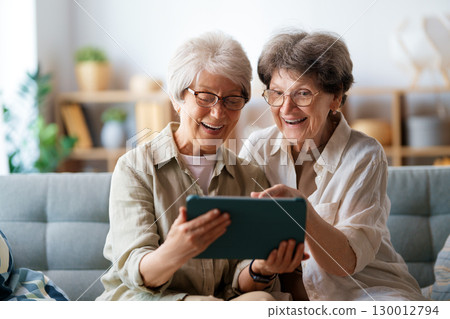 women are using digital tablet women are using digital tablet 130012794