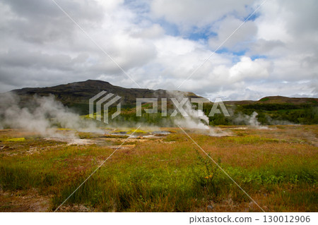 A view of steam rising from the ground at Geysir geothermal area, part of the Golden Circle tourist attraction in the Nordic island nation of Iceland 130012906
