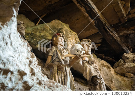 Tau Tau statues in a cave, Toraja, Sulawesi, Indonesia Tau Tau statues in a cave, Toraja, Sulawesi, Indonesia 130013224