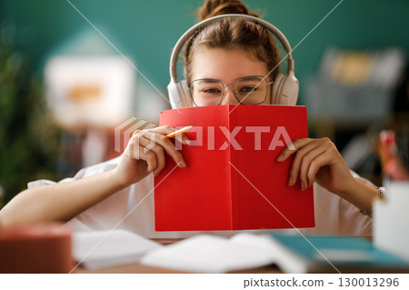 Child is learning in the class 130013296