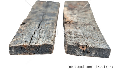 Two weathered wooden planks isolated on a white background showcasing texture and natural imperfections 130013475