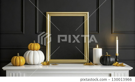 Festive autumn decor scene with pumpkins and a gold frame on a dark wall 130013966