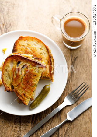 Grilled tuna and cheese sandwiches on sourdough bread. 130014572