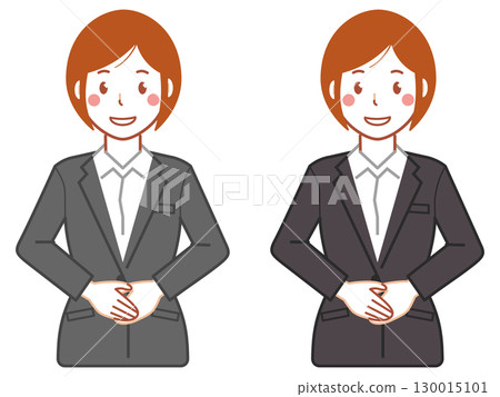 A young woman in a gray suit with short hair clasping her hands together in front of her A young woman in a gray suit with short hair clasping her hands together in front of her 130015101