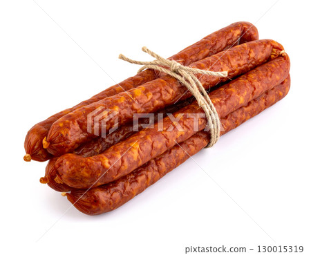 Bundle of thin sausages tied with string lying on white background 130015319