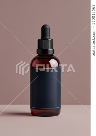 Amber dropper bottle mockup with blank label on minimalist background 130015562