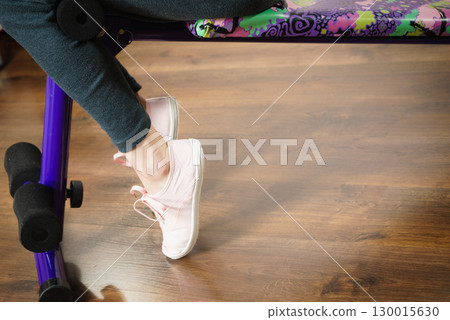 Woman training on bench for sit ups Woman training on bench for sit ups 130015630