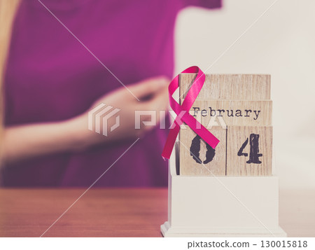 Woman and world breast cancer day on calendar 130015818