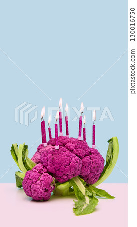 Purple cauliflower decorated with birthday candles on pastel background Purple cauliflower decorated with birthday candles on pastel background 130016750