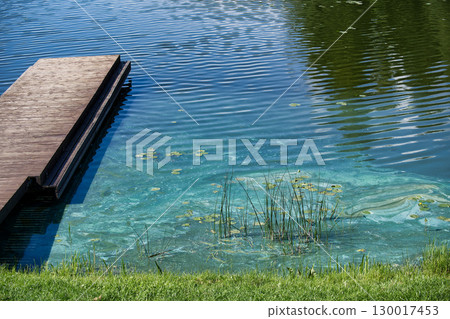 Polluted lake shows the devastating impact of ecological damage, water contamination from wastewater Polluted lake shows the devastating impact of ecological damage, water contamination from wastewater 130017453