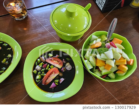 fruit salad with fresh vegetables 130017929