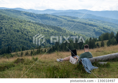 Remote Work in Scenic Mountain Landscape 130018497