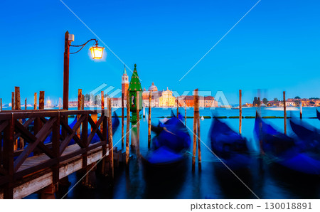Gondolas floating in the Grand Canal at night, Venice 130018891