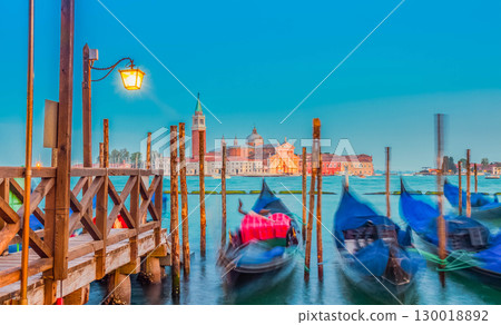 Gondolas floating in the Grand Canal at night, Venice 130018892