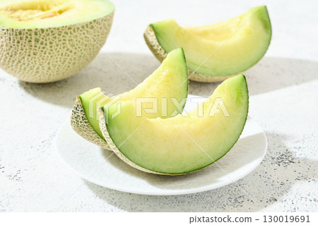 Muskmelon served on a plate Muskmelon served on a plate 130019691