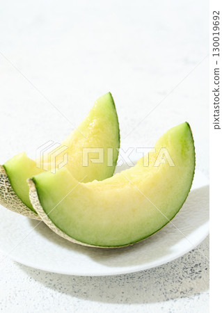 Muskmelon served on a plate Muskmelon served on a plate 130019692