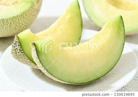 Muskmelon served on a plate Muskmelon served on a plate 130019695